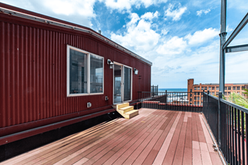Rooftop patio with a lake view in Cleveland